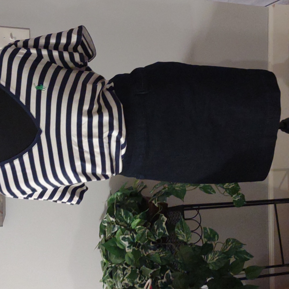 Skort. Dark blue denim Skort,14, elastic waistband. New. No tags.